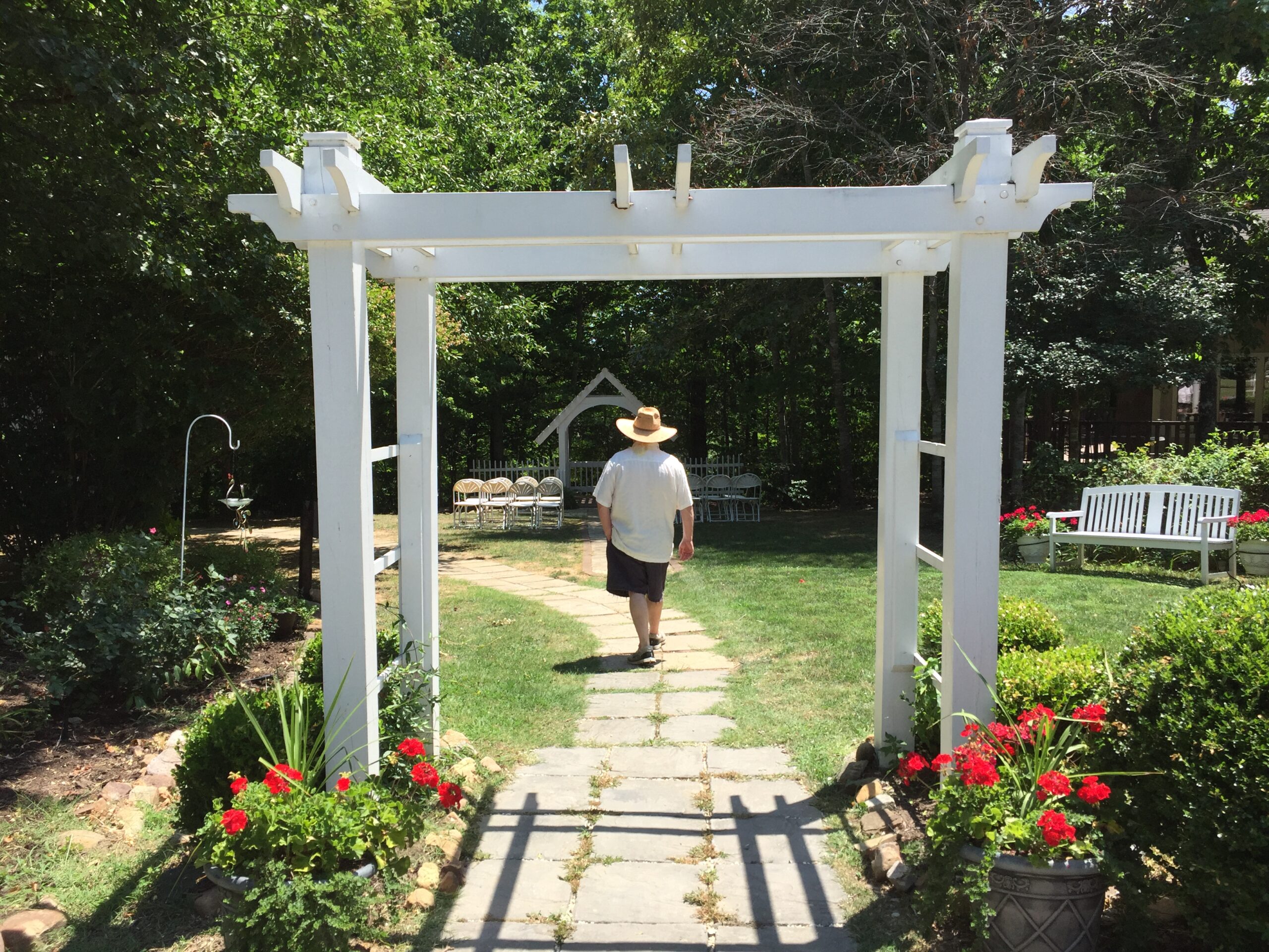 Co-owner, Rick, leads us through the archway to another beautiful outdoor venue