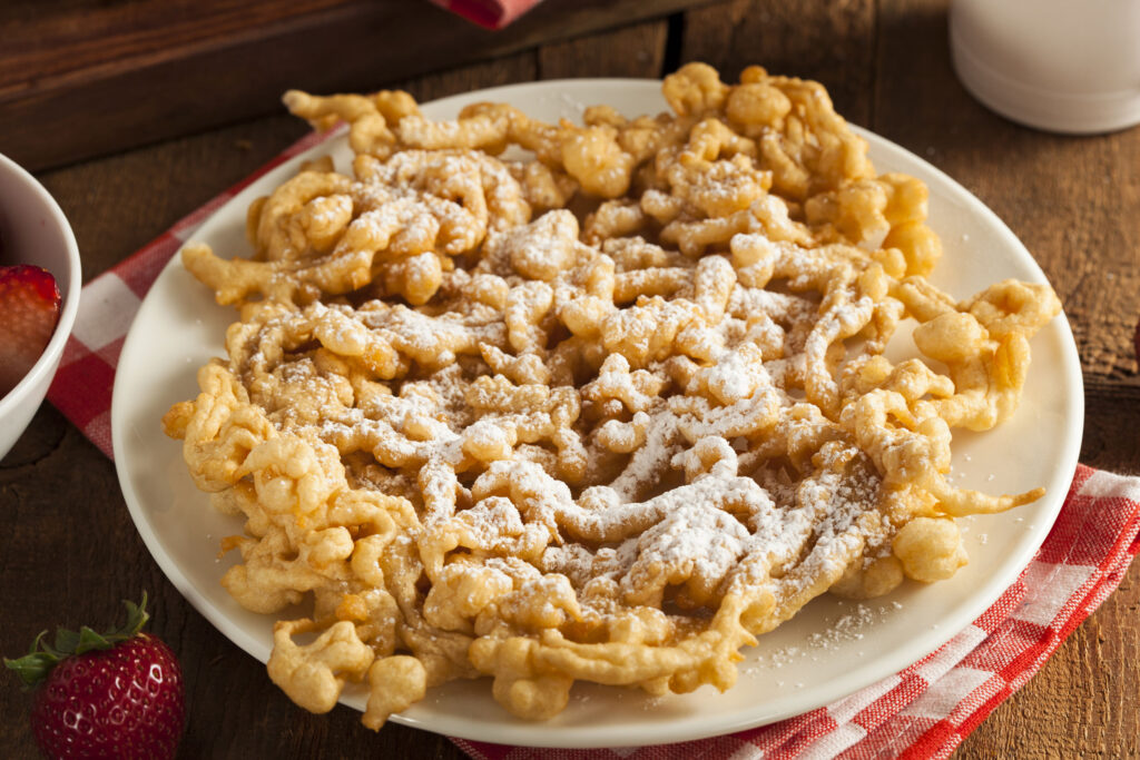 A funnel cake with powdered sugar. There will be plenty of food at the Annual Patriot Festival